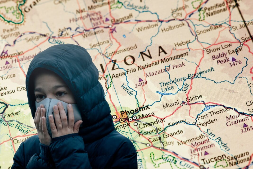 Imagen ilustrativa de una ciudad con el cielo cubierto por una nube de polvo o contaminación.